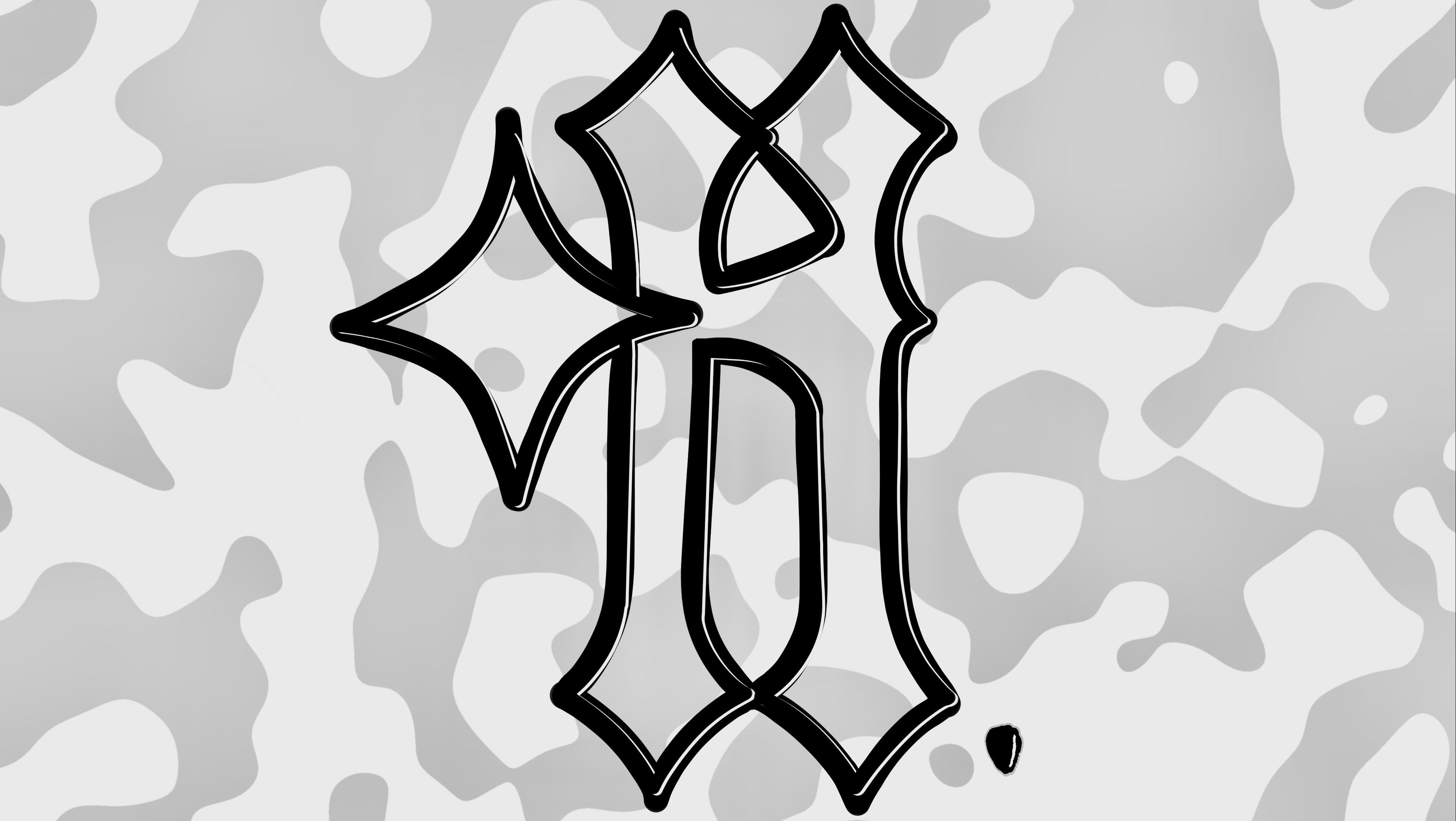 Black star-like symbol on a gray camouflage pattern
